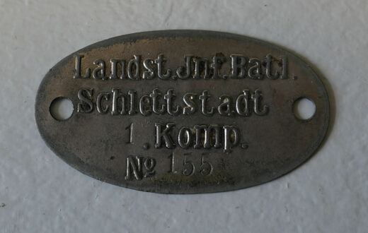 Erkennungsmarke eines Angehörigen der 1. Kompanie des Landsturm-Bataillons Schlettstadt (Inv.-Nr. 19516).